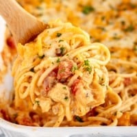 chicken spaghetti on a wooden spoon.