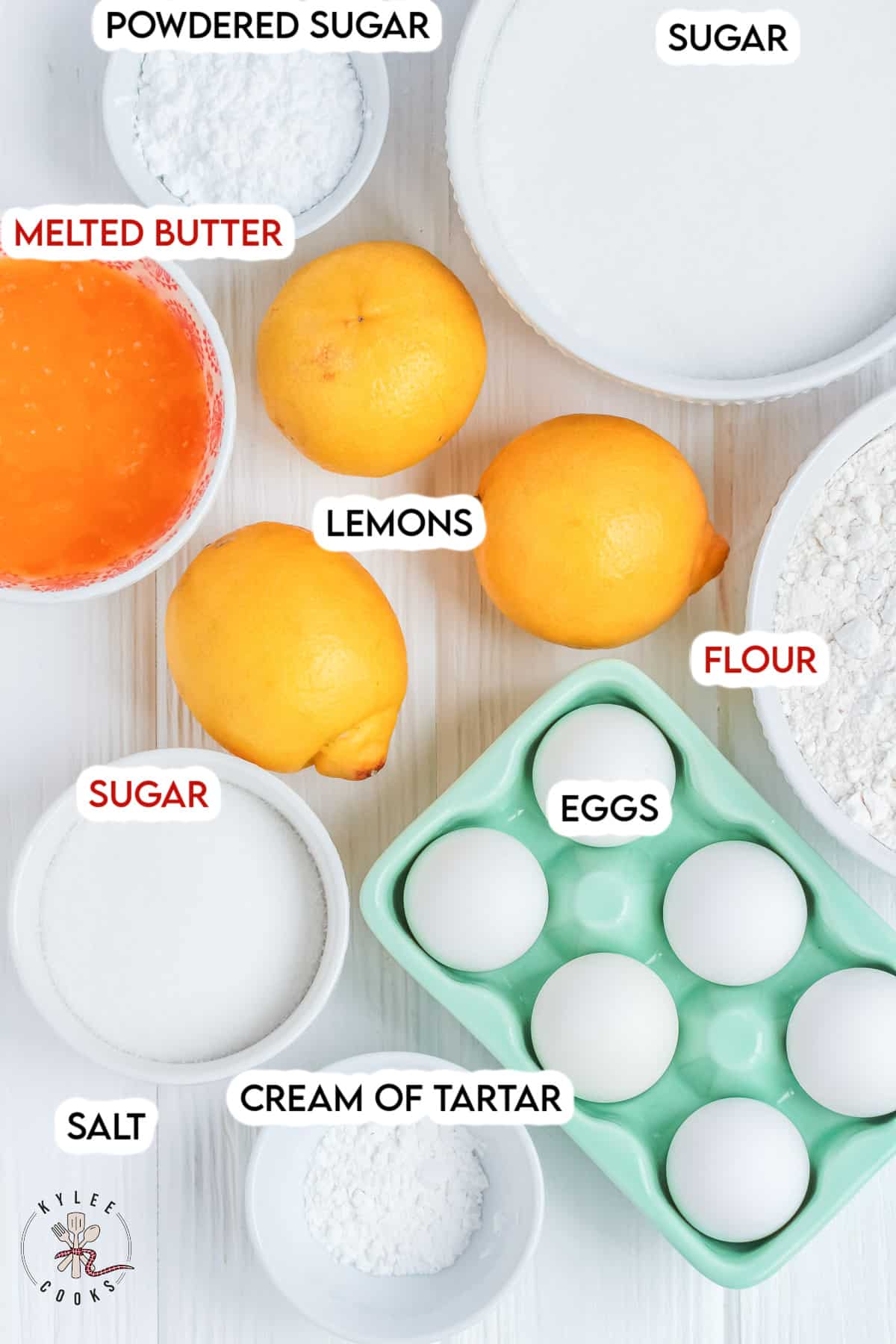 ingredients to make lemon bars laid out and labeled.