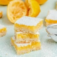 3 lemon bars stacked on top of each other.