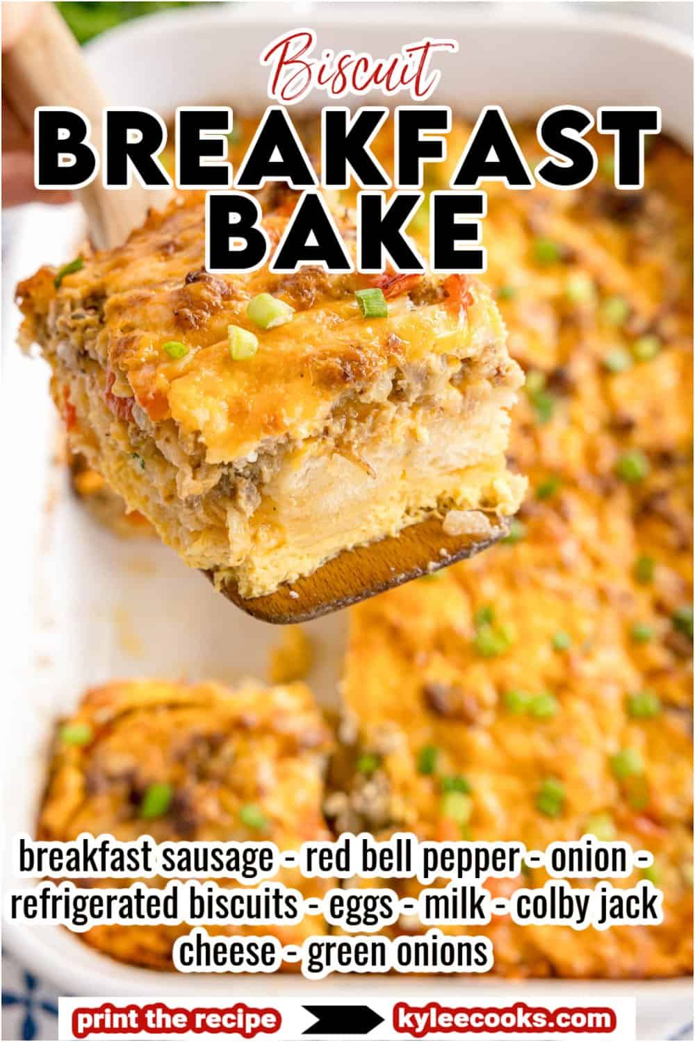 A slice of cheesy breakfast bake with sausage and green onions being lifted from a casserole dish. Text on the image says 'Biscuit Breakfast Bake'. Ingredients listed: breakfast sausage, red bell pepper, onion, refrigerated biscuits, eggs, milk, colby jack cheese, green onions.