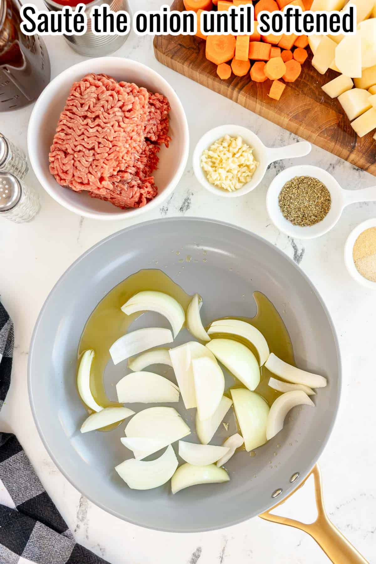 uncooked onions in a skillet.