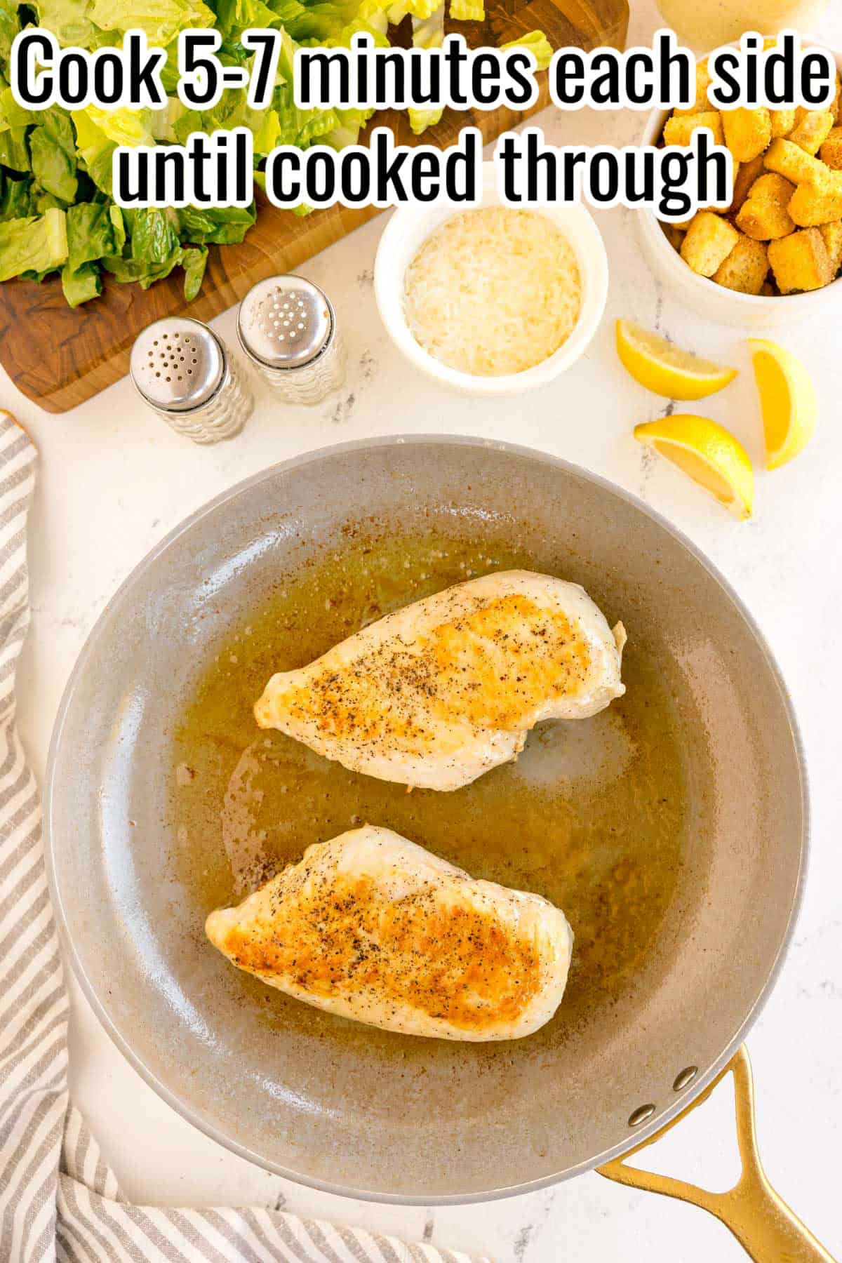 Chicken breasts cooking in a skillet, lightly browned. Text on the image says 'Cook 5-7 minutes each side until cooked through'.