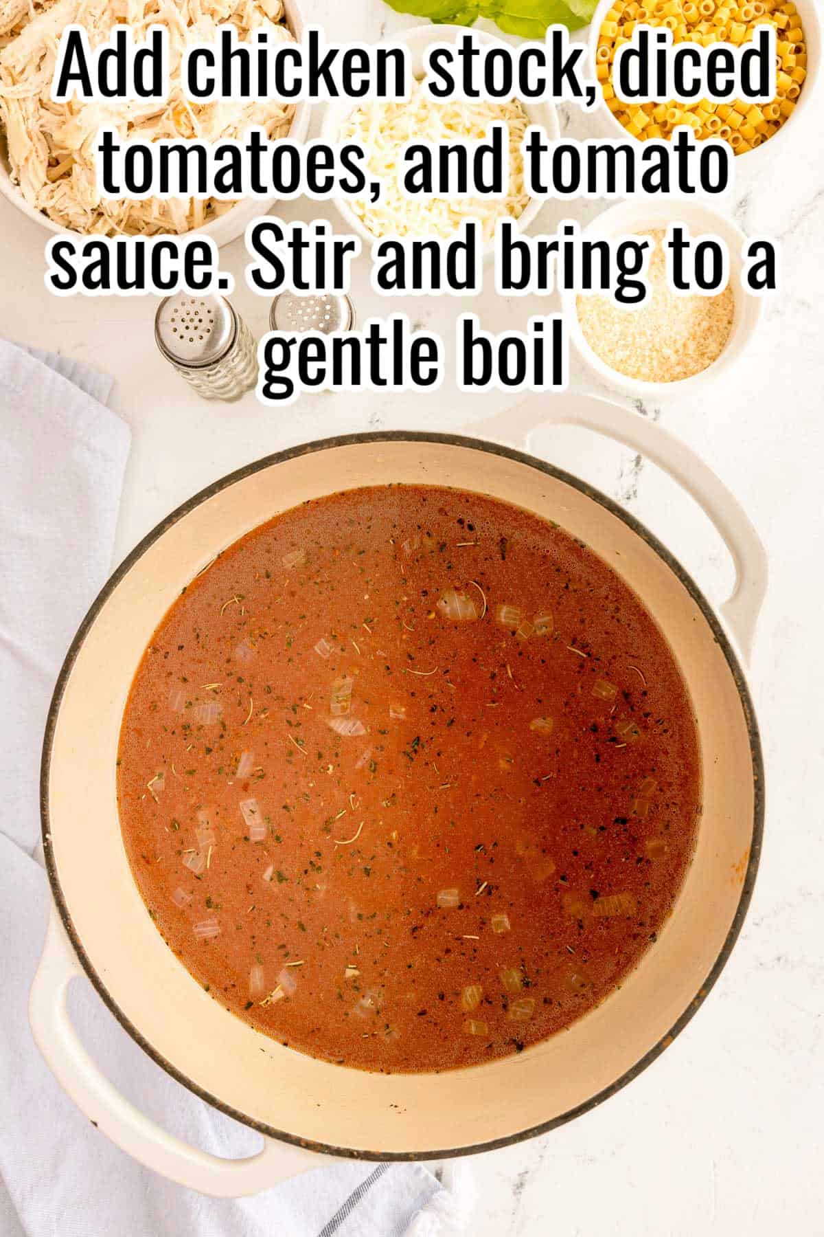 Tomato broth with onions in a pot. Text on the image says 'Add chicken stock, diced tomatoes, and tomato sauce. Stir and bring to a gentle boil'.