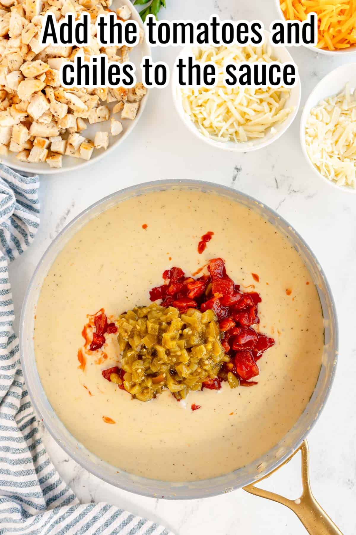 Add the tomatoes and chiles to the creamy sauce.