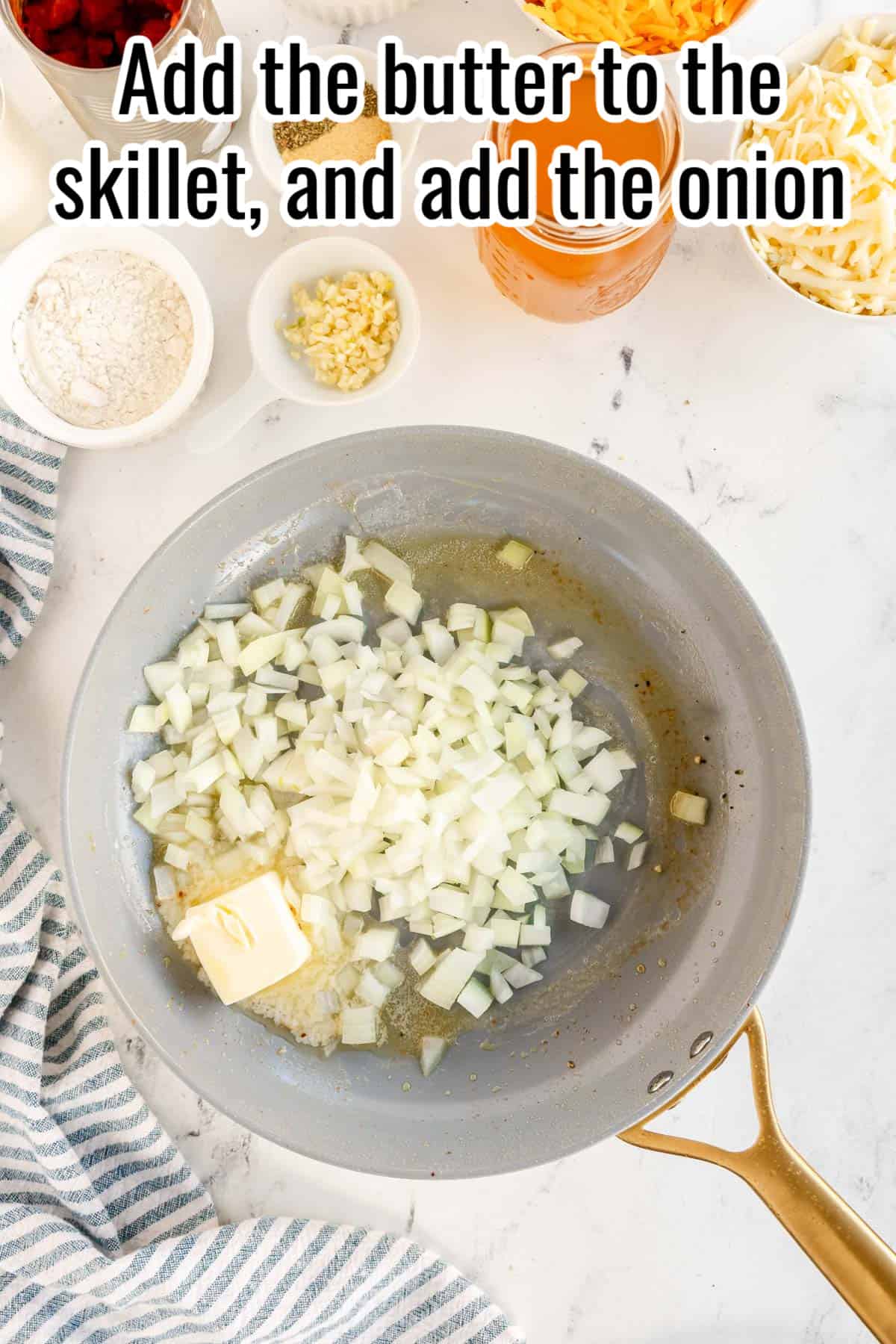 Add the butter to the skillet and add the onion.