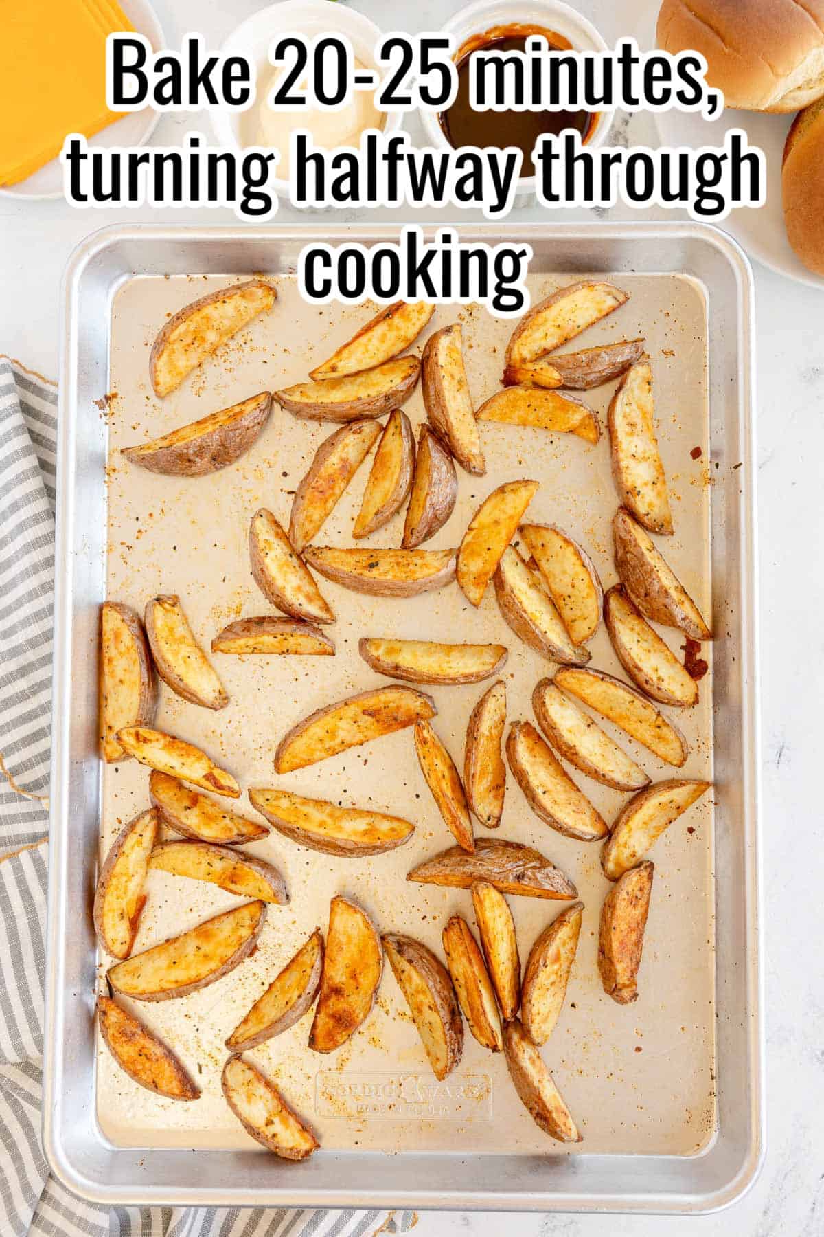 Seasoned potato wedges arranged on a baking sheet. Text on the image says 'Place wedges on a baking sheet'