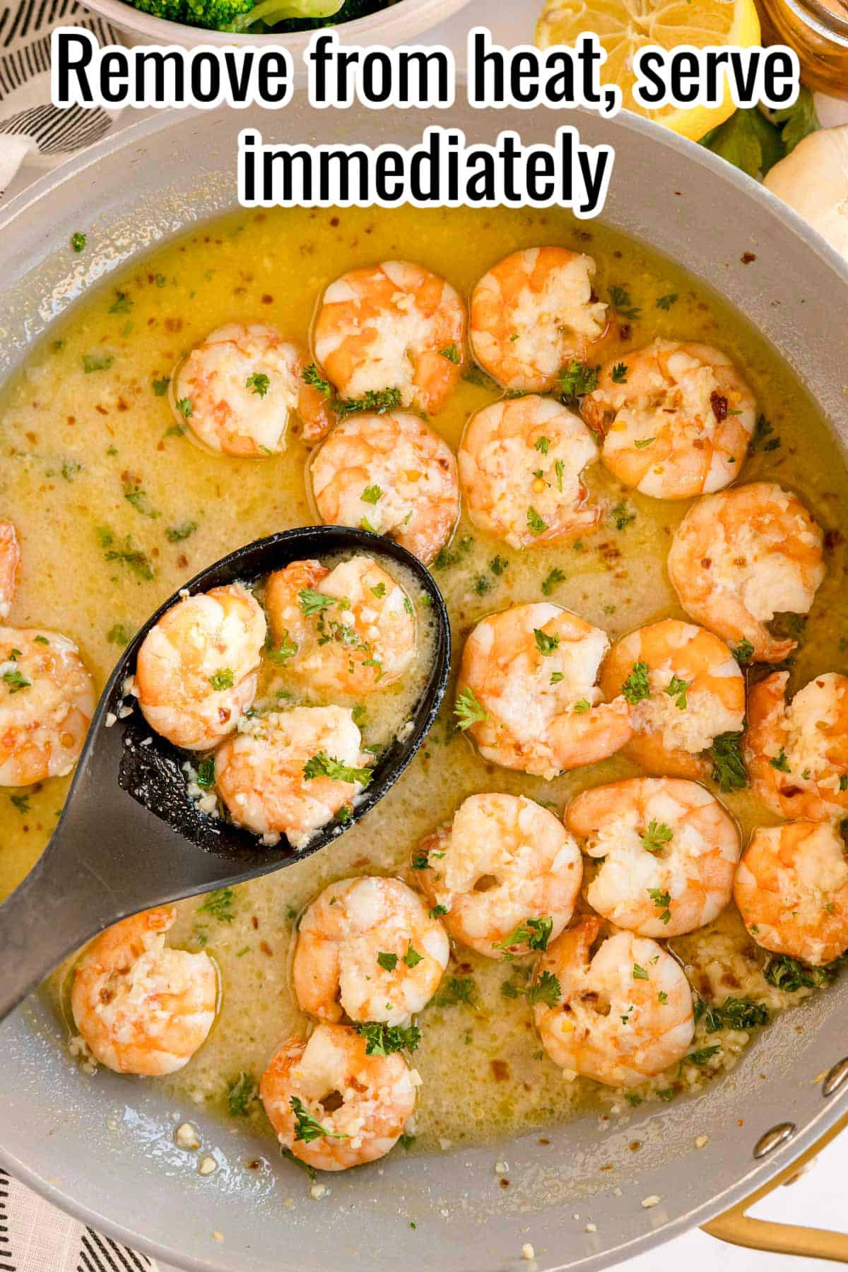 A spoon scooping saucy shrimp from the pan. Text on the image says 'Remove from heat, serve immediately'.