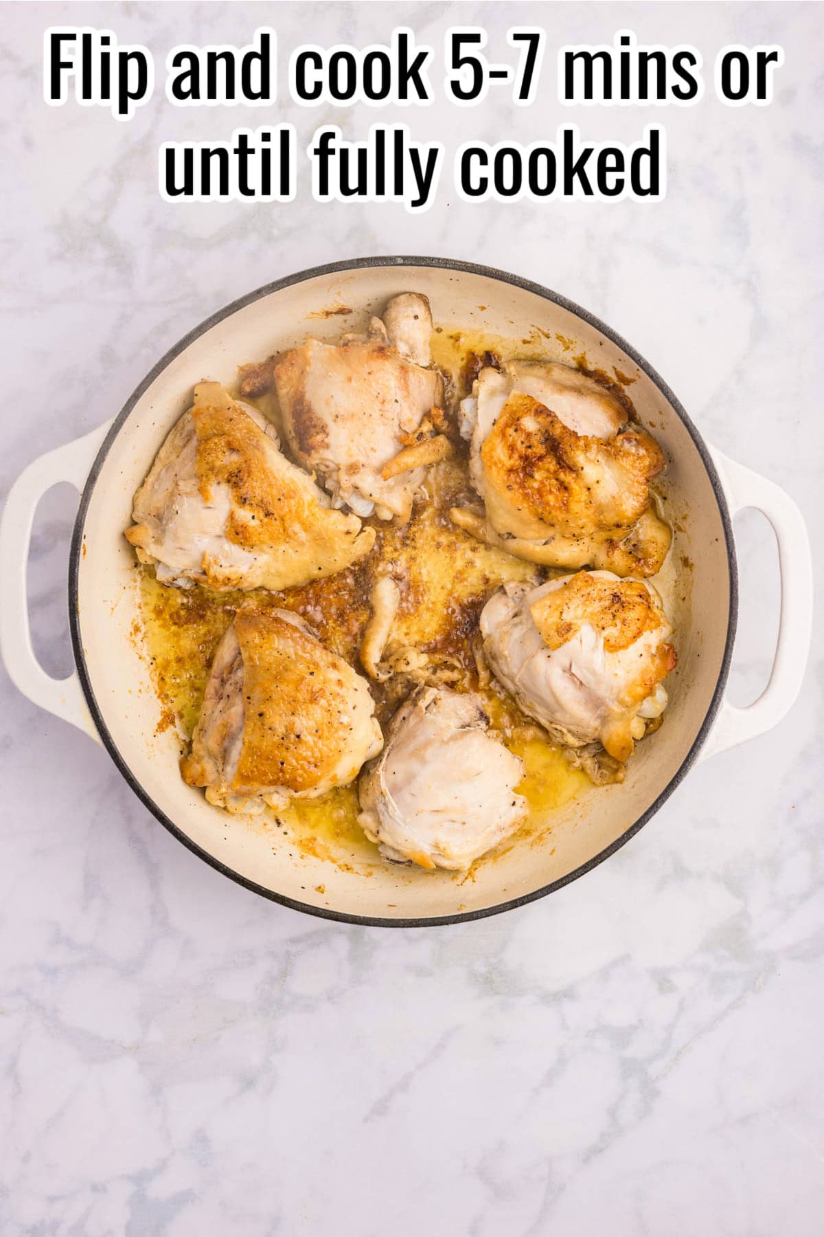 Chicken thighs flipped over in a skillet, partially cooked with golden brown skin. Text on the image says 'Flip and cook 5-7 mins or until fully cooked'.