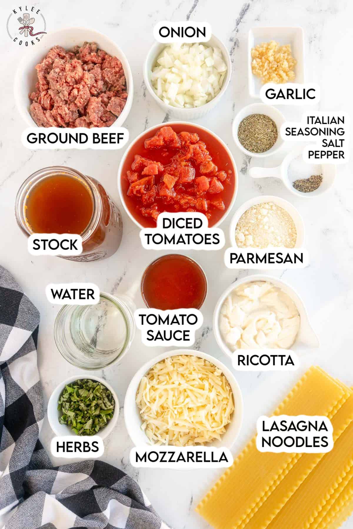 ingredients to make slow cooker lasagna soup laid out and labeled.